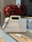 T0US medium shopper amaya coral manifesto 620034