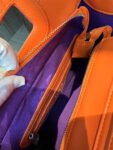 T0US medium shopper amaya coral manifesto 620034