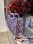 T0US medium shopper amaya coral manifesto 620034